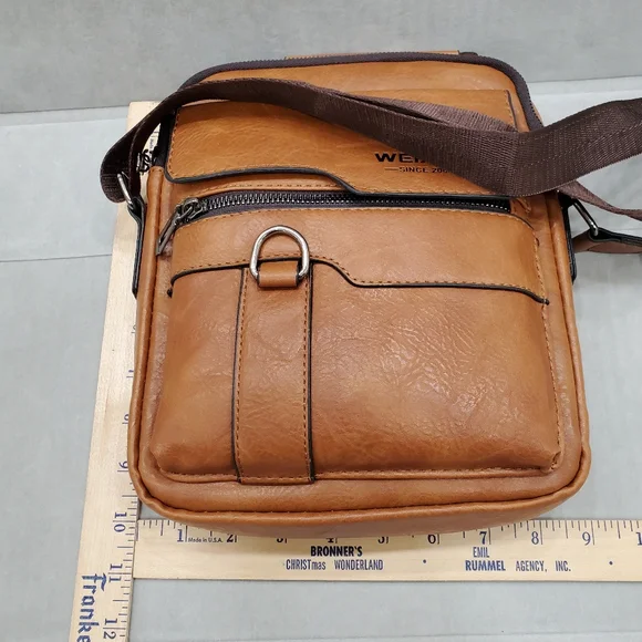 Weixier travel bag men's brown leather 9×10×2 inches adjustable strap NEW